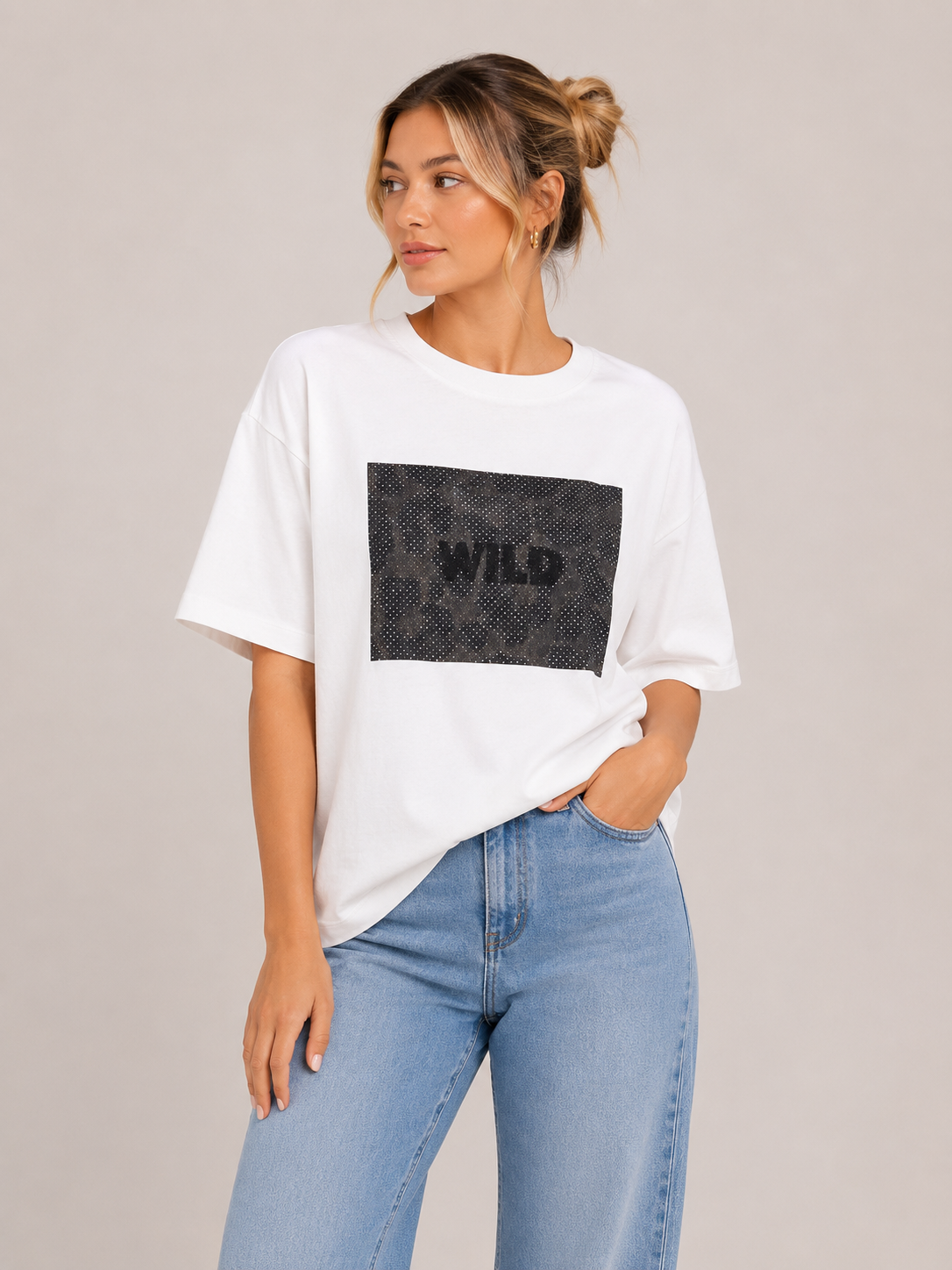A relaxed-fit oversized t-shirt crafted from soft, breathable fabric with a modern graphic print.